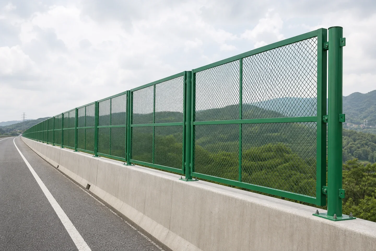 Long green framed anti-throw mesh run along an elevated road