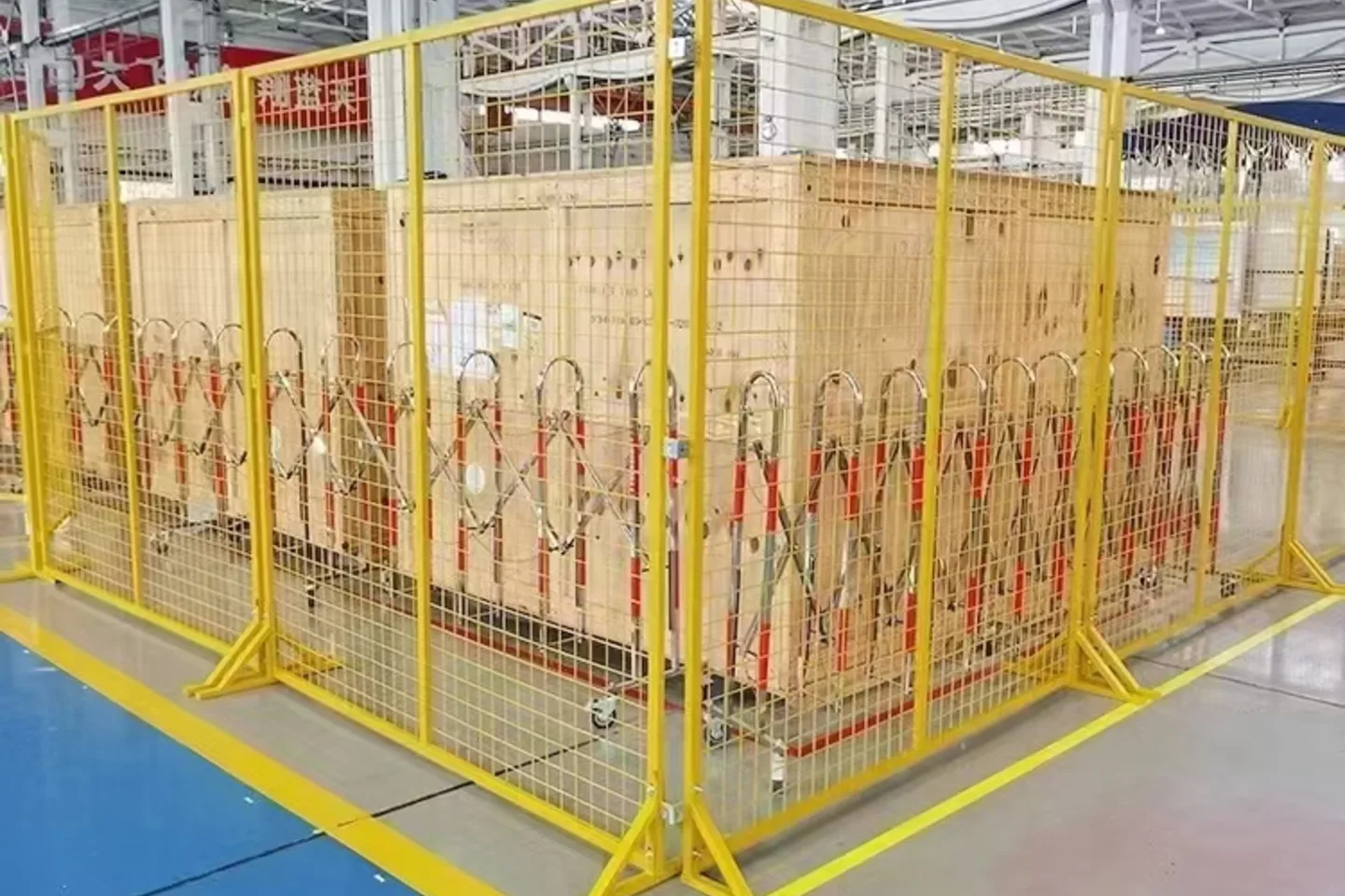 Yellow framed mesh warehouse enclosure